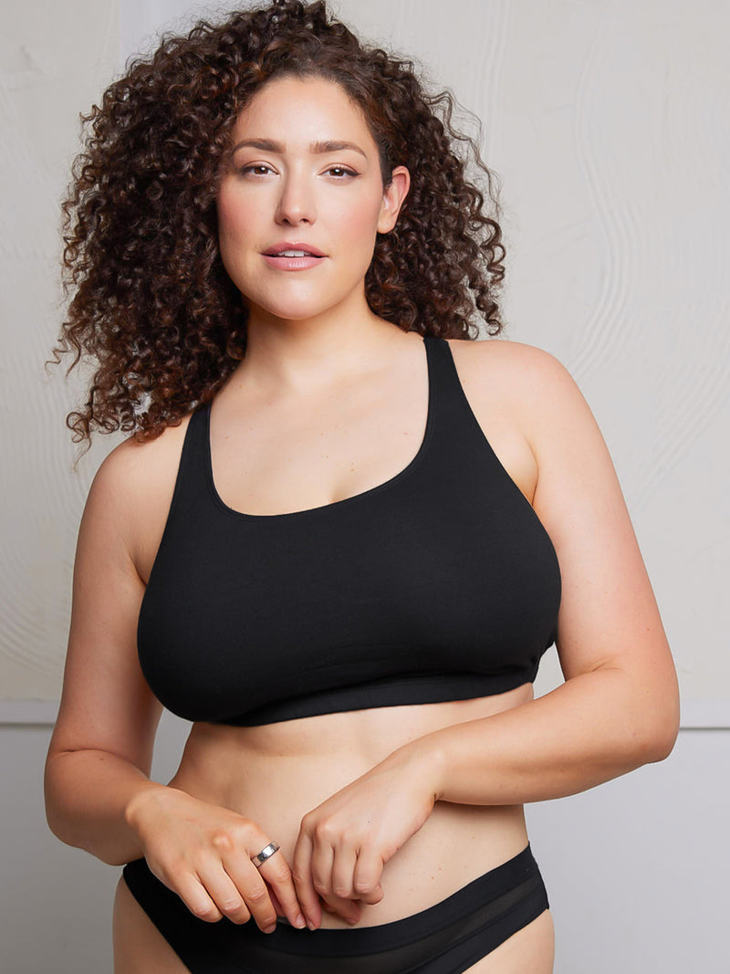 Side view of cotton wirefree sports bra in black